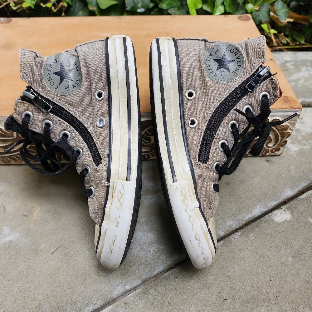 Distressed Converse High Top Sneakers